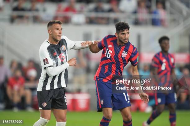 Francisco Calvo of Costa Rica and Ricardo Pepi of the United Sates battle for a ball during a game between Costa Rica and USMNT at Lower.com Field on...