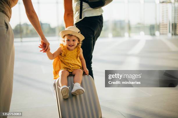 young family having fun traveling together - baby gate imagens e fotografias de stock