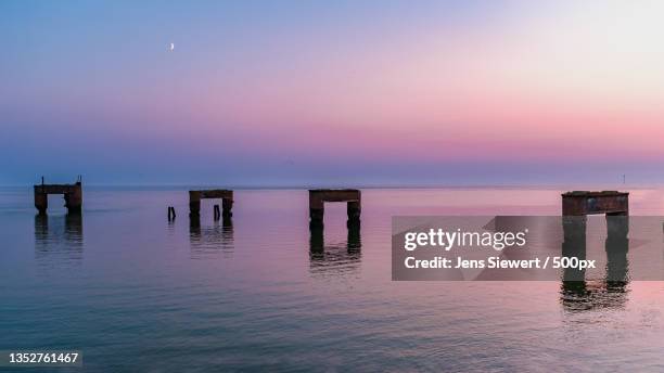scenic view of sea against sky during sunset,butjadingen,germany - jens siewert stock pictures, royalty-free photos & images