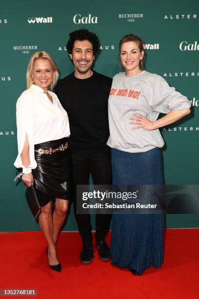 Nova Meierhenrich, Boris Entrup and Nina Bott attend the GALA Christmas Shopping Night at Alsterhaus on November 11, 2021 in Hamburg, Germany.