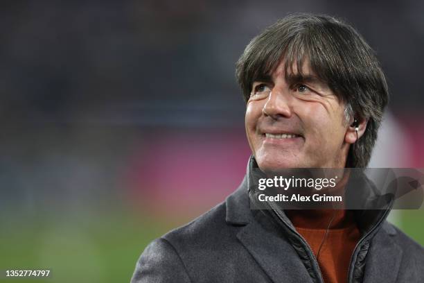 Former Germany head coach Joachim Loew talks to TV prior to the 2022 FIFA World Cup Qualifier match between Germany and Liechtenstein at Volkswagen...