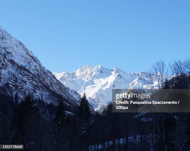 scenic view of snowcapped mountains against clear blue sky,monte rosa,varese,italy - monte rosa fotografías e imágenes de stock