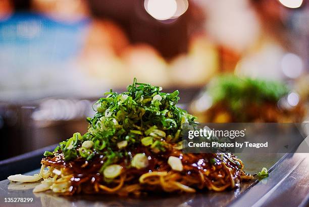 hiroshima-style okonomiyaki - okonomiyaki stock pictures, royalty-free photos & images