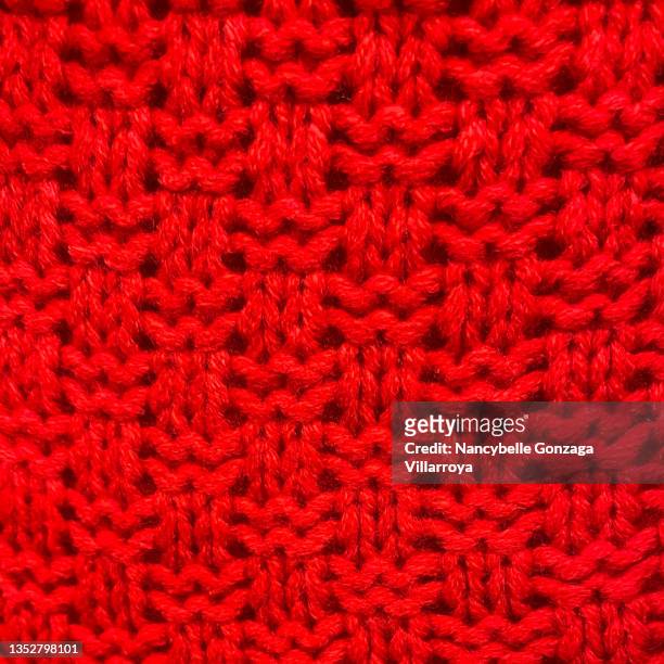 bright red knitted fabric - wool coat stock pictures, royalty-free photos & images