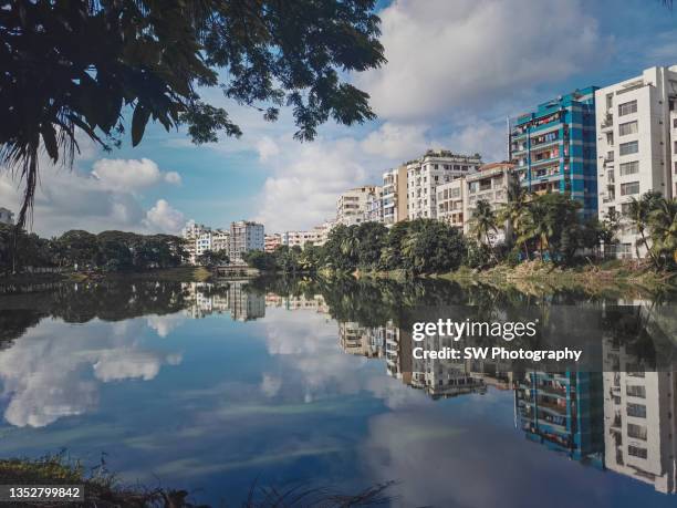 mobile device photo of the beautiful gulshan lake in city center of dhaka, bangladesh - old dhaka stock pictures, royalty-free photos & images