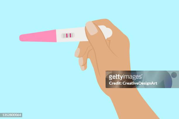 陽性妊娠検査を受け取る女性の手 - gynecological examination点のイラスト素材／クリップアート素材／マンガ素材／アイコン素材