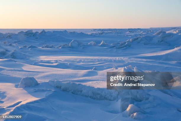 winter arctic landscape. the frozen sea. - siberia stock pictures, royalty-free photos & images