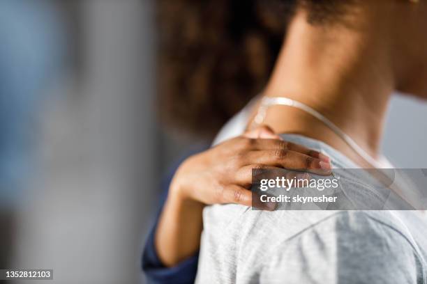 embracing a mother! - two friends arms around shoulders stock pictures, royalty-free photos & images