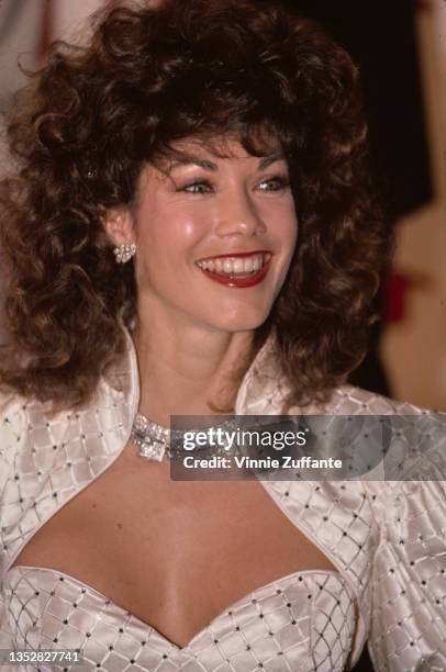 American singer and actress Barbi Benton attends the Hollywood premiere of 'City Heat' held at Mann's Chinese Theatre in Los Angeles, California, 5th...
