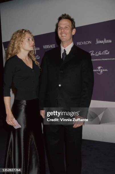 Elizabeth Rogers and her husband, American actor and film director Peter Berg attend the 9th Annual Fire & Ice Ball, held at Universal Studios in...