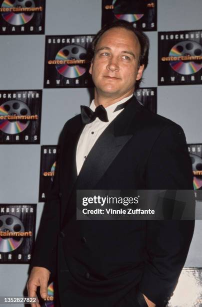 American actor and comedian Jim Belushi, wearing a tuxedo and bow tie, attends the 2nd Annual Blockbuster Entertainment Awards, held at the Pantages...