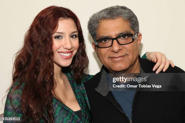 Host of 'PalTalk' Diana Falzone and Deepak Chopra attend the Deepak Chopra press reception at Paltalk Studio on December 8, 2011 in New York City.