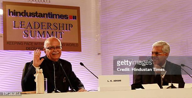 Senior BJP Leader L K Advani answering the question while moderator Karan Thapar looks on during the second day of Hindustan Times Leadership Summit...