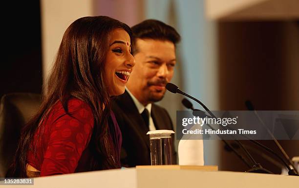 Bollywood Actor Vidya Balan along with Vir Sanghvi share a light moment during the second day of Hindustan Times Leadership Summit 2011 at The Taj...