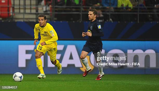 Jorge Wagner of Kashiwa Reysol gets away from Dave Mulligan of Auckland City during the FIFA Club World Cup match between Kashiwa Reysol and Auckland...