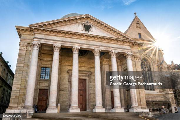 exterior of the saint pierre cathedral in geneva, switzerland - st pierre cathedral geneva stock pictures, royalty-free photos & images