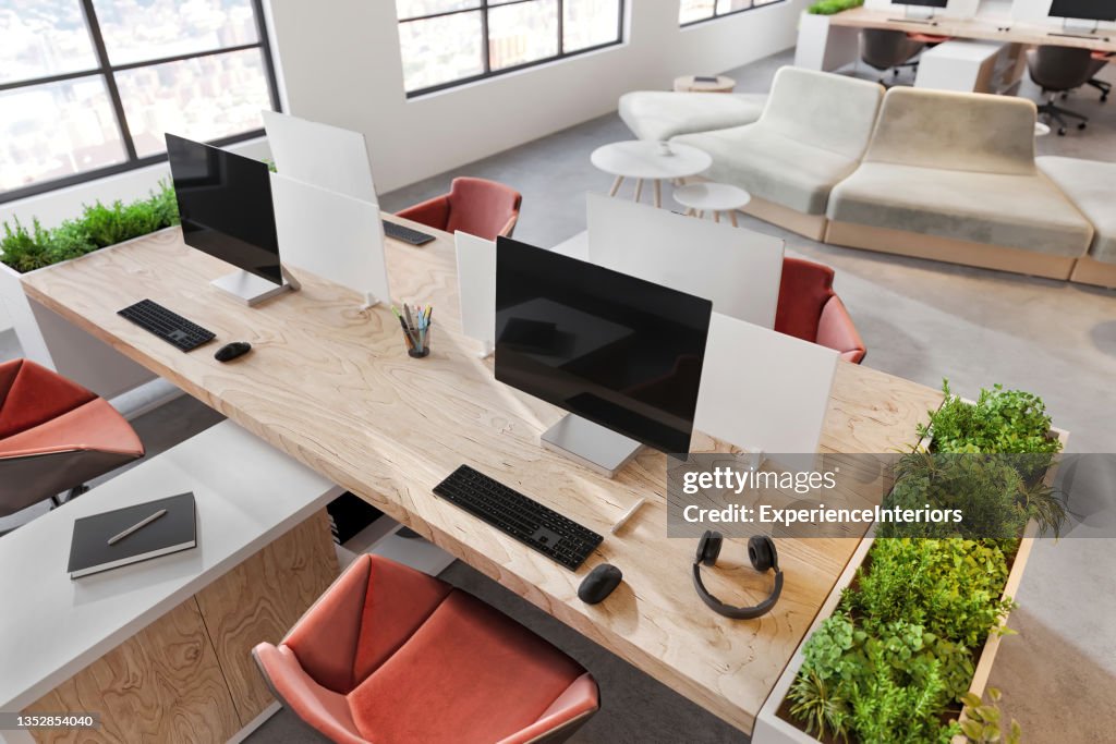 Office Desk With Multiple Working Stations High-Res Stock Photo - Getty ...