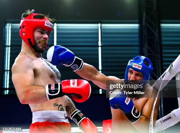 Myslenice , Poland - 30 June 2023; Peter Carr of Ireland, left, in action against Aleksandar Konovalov of Serbia in their Kickboxing Men's Full...