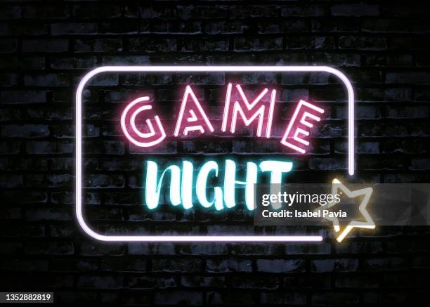 game night  in neon lights - game night stock pictures, royalty-free photos & images