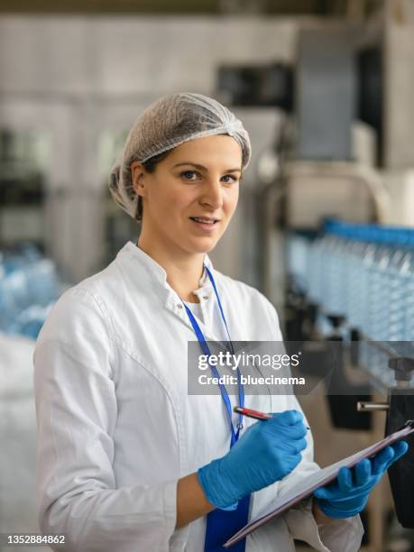 control staff - hair net stock pictures, royalty-free photos & images