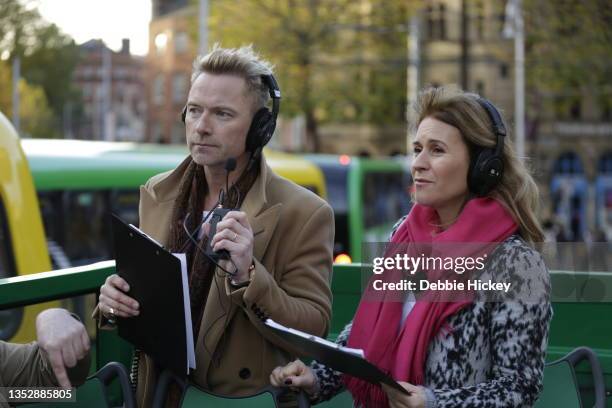 Ronan Keating and Harrier Scott host Magic Breakfast from a Do Dublin Green Bus on November 12, 2021 in Dublin, Ireland.