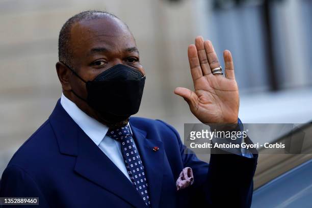 President of Gabon Ali Bongo Ondimba wave to the press from the stairs of the Elysee Palace, in Paris on November 12, 2021. World leaders and...