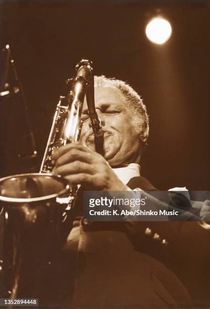 Dexter Gordon plays tenor saxophone backlit, Yamaha Hall, Tokyo, Japan, 24 March 1981.