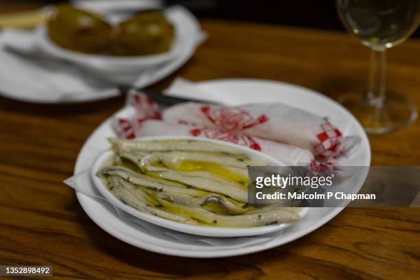 tapas - anchovy fillets in olive oil - cordoba spain stock pictures, royalty-free photos & images