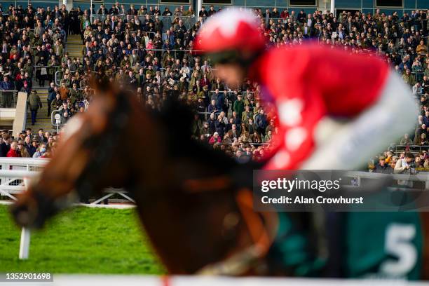 Large crowd watch the action at Cheltenham Racecourse on November 12, 2021 in Cheltenham, England.