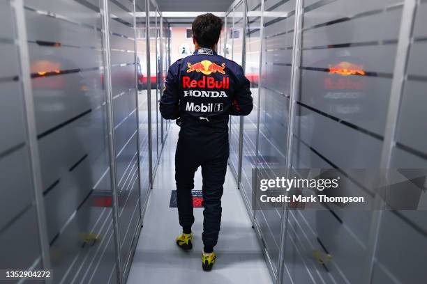 Sergio Perez of Mexico and Red Bull Racing walks in the garage during practice ahead of the F1 Grand Prix of Brazil at Autodromo Jose Carlos Pace on...