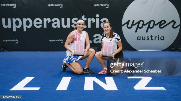 Natela Dzalamidze of Russia and Kamilla Rakhimova of Russia pose with the trophy during the WTA Upper Austria Ladies Linz doubles-finals on November...