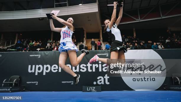 Natela Dzalamidze of Russia and Kamilla Rakhimova of Russia pose with the trophy during the WTA Upper Austria Ladies Linz doubles-finals on November...