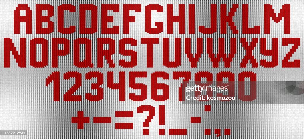 Alphabet knitted on a white background with red yarn