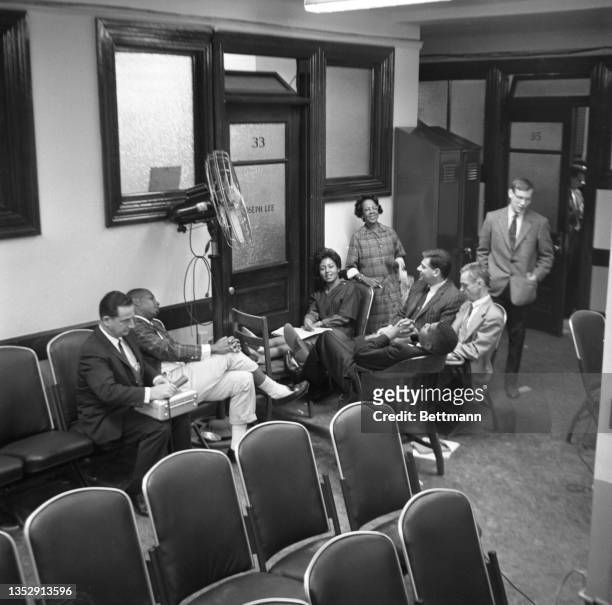 Group of students are shown seated outside of the office of School Committeeman, Joseph Lee, where they will remain all night. The students are...