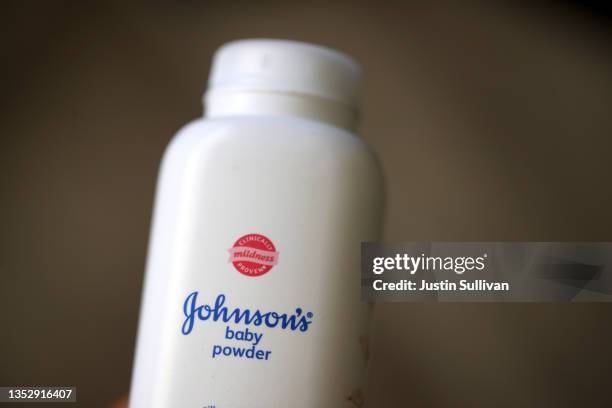 In this photo illustration a bottle of Johnson & Johnson baby powder is displayed on a table on November 12, 2021 in San Anselmo, California. Johnson...