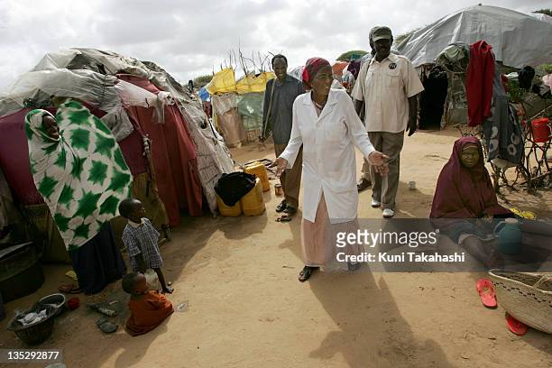 Dr. Hawa Abdi walks through Hawa Abdi Camp for Internal Displaced Persons October 8, 2007 in the south of Mogadishu, Somalia. The clinic is run by...
