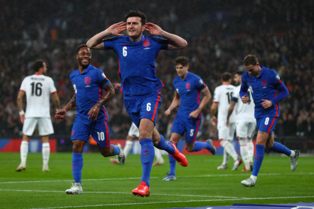 Harry Maguire of England celebrates after scoring their side's first goal during the 2022 FIFA World Cup Qualifier match between England and Albania...
