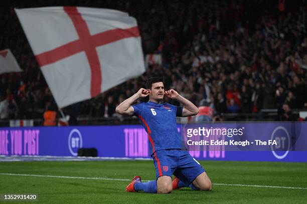 Harry Maguire of England celebrates after scoring their side's first goal during the 2022 FIFA World Cup Qualifier match between England and Albania...