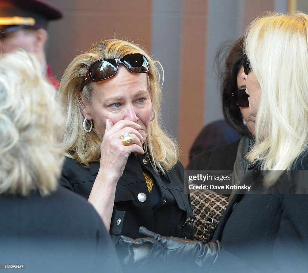 Guests attend the funeral service for Andrew Ali Aga Khan Embiricos