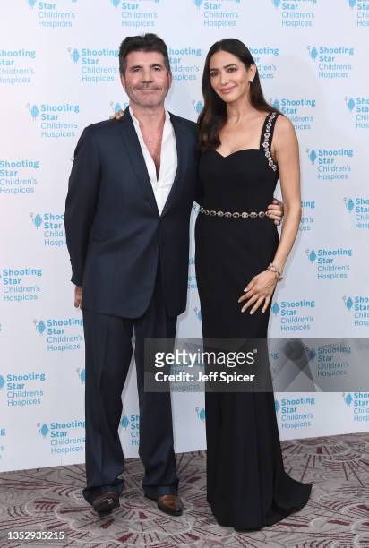 Simon Cowell and Lauren Silverman attend the Shooting Star Ball in aid of Shooting Star Children's Hospices at the Royal Lancaster Hotel on November...