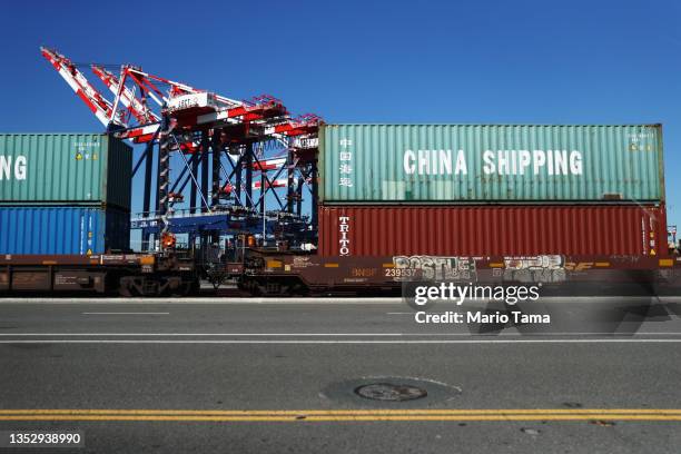 Cranes stand above shipping containers after Sen. Alex Padilla gave a press conference at the Port of Long Beach on November 12, 2021 in Long Beach,...