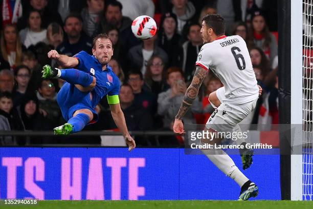 Harry Kane of England scores their side's fifth goal and his hat-trick during the 2022 FIFA World Cup Qualifier match between England and Albania at...