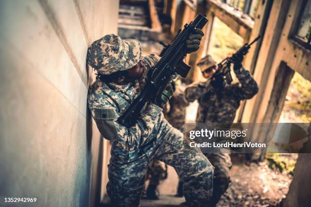 military men on a mission - stealth stock pictures, royalty-free photos & images