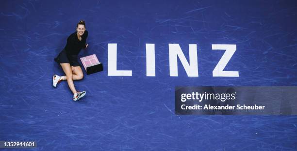 Alison Riske of the United States celebrates with the trophy during the final of the WTA Upper Austria Ladies Linz on November 12, 2021 in Linz,...