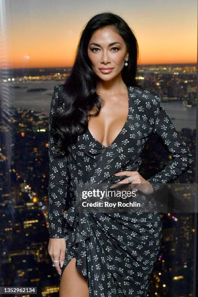 Nicole Scherzinger of NBC's Annie Live! and FOX's The Masked Singer visits The Empire State Building on November 12, 2021 in New York City.