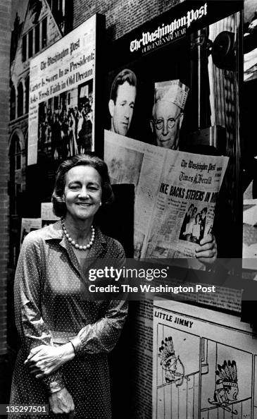 Katharine Graham in front of a montage in the Washington Post's lobby