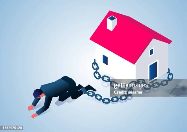 ilustrações de stock, clip art, desenhos animados e ícones de under the pressure of housing loans and high housing prices, isometric businessmen’s legs are tied up with chains and the house is kneeling and crawling forward. - corruption