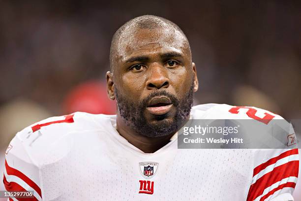 Brandon Jacobs of the New York Giants on the sidelines during a game against the New Orleans Saints at Mercedes-Benz Superdome on November 28, 2011...