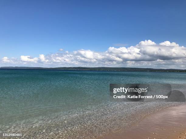 scenic view of sea against sky,traverse city,michigan,united states,usa - michigan summer stock pictures, royalty-free photos & images