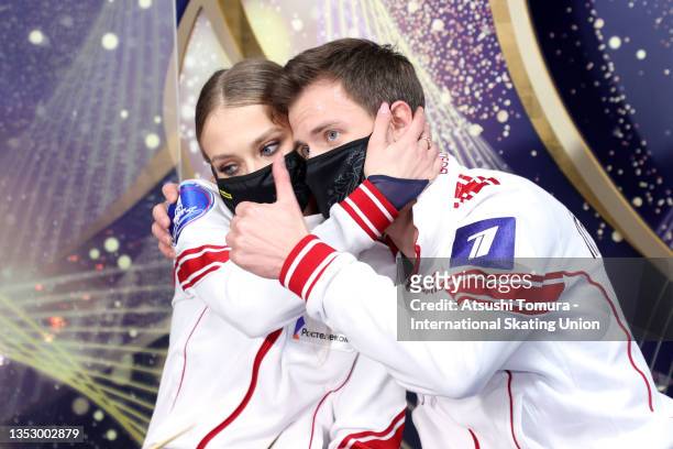Victoria Sinitsina and Nikita Katsalapov of Russia celebrate winning the gold medals at the kiss and cry after competing in the Ice Dance Free Dance...